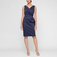 Design your evening look in the elegance and comfort of this sleeveless women's sheath dress from the Atelier Danielle Compression Collection. Cut to a knee-length, it's beautifully crafted from smoothing, bonded scuba fabric. It features a v-neckline and a wrap-style waist with a drape, gathered side detail that highlights your silhouette, and a concealed back zip closure. Pair with heels to showcase the sleek, sophisticated styling to the next special event.Strap Type: TankFeatures: Stretch Fa Sheath Dresses, Womens Sheath Dress, Scuba Fabric, Sleeveless Sheath Dress, Sophisticated Style, Dress Blue, Wrap Style, Special Event, Sheath Dress