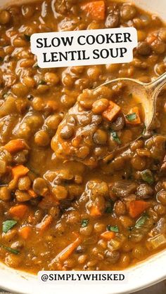 a bowl filled with lentils and carrots next to a sign that says slow cooker lentil soup