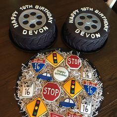 two cakes decorated to look like cars and stop signs