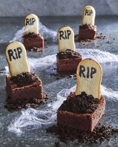 halloween treats with tombstones on top of them