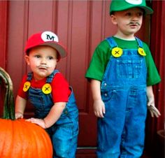 two young boys dressed up as mario and luigi