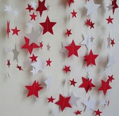 red and white stars hanging from the ceiling