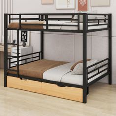 a bunk bed with drawers underneath it in a room that has white walls and wood floors