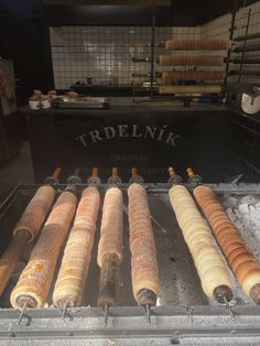 there are many different types of breads on the grill