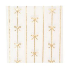 a white and gold striped wallpaper with bows on the top, along with stripes