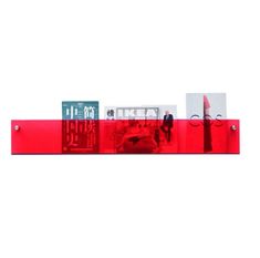 a red shelf that has some pictures on it