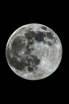 the full moon is seen in the sky with no clouds on it's side