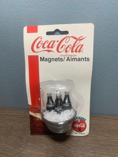 coca - cola magnets are in the package