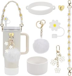 the contents of a set of jewelry including a mug, bracelets, and keychains