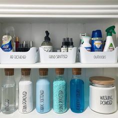 an organized pantry shelf filled with personal care products and hand sanitizers for cleaning