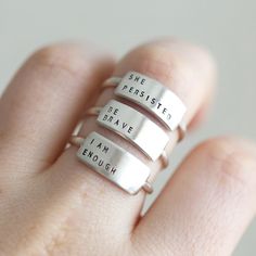 If you love the Enneagram like we do, this ring is calling your number! Let everyone know your enneagram number in style! Made exclusively for us by Christina Kober, each ring is sterling silver and hand stamped with your enneagram number. These make a great conversation starter! They also make a perfect gift for any fan of the enneagram. details custom stamped with your enneagram number message plate measures 5/8" wide x 1/4" tall contact us if you need a different size: available ring sizes 3 Cheap Silver Stackable Rings Hand Stamped, Cheap Adjustable 925 Stamped Rings, Cheap Everyday Hand Stamped Stackable Rings, Cheap Hand Stamped Stackable Round Rings, Cheap 925 Stamped Jewelry For Anniversary, Cheap Sentimental Rings For Gifts, Cheap Stamped 925 Jewelry For Anniversary, Engraved Ring Funny, Quote Rings