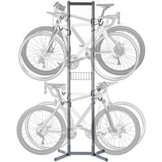 three bikes are stacked on top of each other in the shape of a bike rack