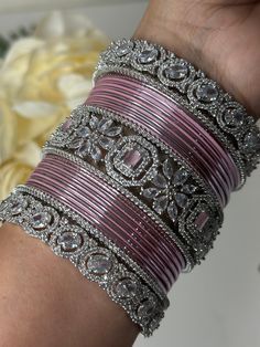 Indian Bangles Set For Womens And Girls.  Occasions Like : Weddings, Family Functions, Festivals etc Care instructions Keep Jewelry away from direct heat, water, perfumes, deodorants and other strong chemicals as they may react with the metal or plating. Some coloring can come of from the bottom of bangles due to contact with excessive sweat or water, which can be easily washed off with soap. Please message me if you need any sold out colors .. I can check and get back within minutes Please reco Ad Bangles Set, Ad Bangles, Bangles Design, Pink Silver Bangles Set, Bangles For Pink Lehenga, Indian Bangles, Pink Crystal Bangle For Party, Cheap Pink Traditional Bangle, Pink Hand-set Bangle Jewelry