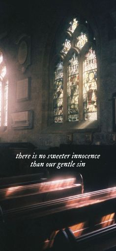 a church with stained glass windows and the words there is no sacred incocence than our gentle sin