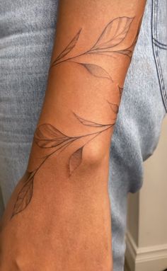 a person with a tattoo on their arm