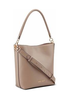 Nine West's designer Donella bucket crossbody bag is great silhouette to dress up or down. It converts from bucket to crossbody and is made from beautiful, soft lamb-like material with gold-tone metal hardware. | Nine West Donella Bucket Crossbody Bag Metal Hardware, Gold Tone Metal, Nine West, Crossbody Bag, Gold Tones, Dress Up, Gold