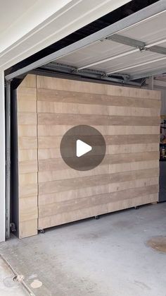 an open garage door with a video screen