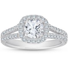 a diamond ring with two rows of diamonds on the band and an oval center stone