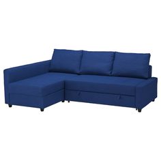 a blue sectional sofa with two pillows on the back and one arm folded over it