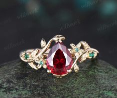 - Metal: Solid gold(10K/14K/18K white/yellow/rose gold),925 sterling silver,platinum available- Main Stone: 6x8mm pear lab ruby.- Accent Stone: lab emeralds- Band Width: 1.4mm- Can be personalized: Yes Red Wedding Ring, Gemstone Jewelry Earrings, Wedding Ring Women, Ruby Wedding Band, Emerald Band, Emerald Wedding Rings, Emerald Wedding, Ruby Engagement Ring, Ring Women