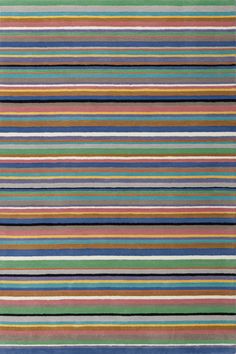 a multicolored rug with vertical stripes