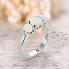 three opalite stone ring in white gold