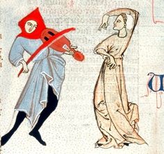 two women in medieval clothing one is holding a red object and the other has a black hat