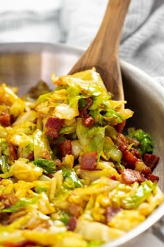 a close up of a bowl of food with broccoli and bacon