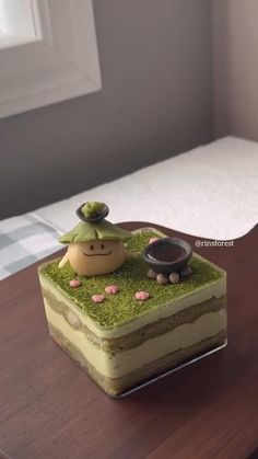 a piece of cake sitting on top of a wooden table