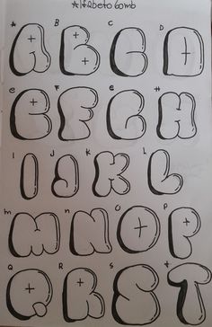 the letters and numbers are drawn in black ink on white paper with some type of writing