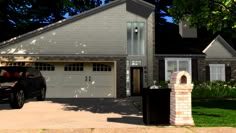 a car is parked in front of a house with two garages on each side