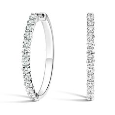 Luxe Shared Prong Diamond Hoop Earrings - 18K White Gold. These glamorous hoop earrings feature dazzling prong set diamonds with simple latch backs to keep these elegant earrings in place. Classic Platinum Hoop Diamond Earrings, Formal Huggie Diamond Earrings With Halo, Formal Halo Huggie Diamond Earrings, Classic Platinum Hoop Earrings With Round Cut, Classic Platinum Hoop Earrings For Wedding, Classic Platinum Hoop Earrings, Classic Platinum Round Cut Hoop Earrings, Formal Round Hoop Earrings With Prong Setting, White Diamond Hoop Earrings For Formal Occasions