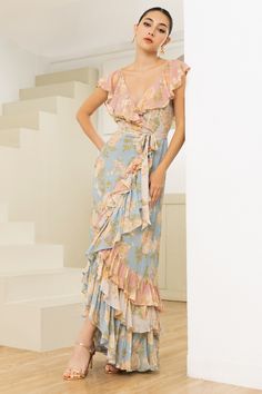 The Tilda Maxi Wrap Dress has beautiful ruffled details on the shoulders and at the hem for an added touch of femininity. It's perfect for making a fashion statement with subtle, romantic flair! LENGTH: 59" From top of shoulder FABRIC: ﻿100% Viscose Georgette with polyester lining STYLE#: DR-20814 in MELLOW FIELD- MELFD-F23 *Model is wearing size XS *Dry Clean Only Pear Shaped Dresses, Bias Cut Dress, Yumi Kim, Halloween Costume Outfits, Ruffled Maxi Dress, Women Denim Jeans, Fall Fashion Outfits, Maxi Wrap Dress, Winter Fashion Outfits