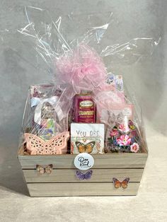 a wooden box filled with lots of different items