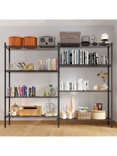 an empty shelf with many books and other items on it in a living room area