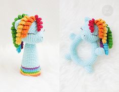 two crocheted unicorns sitting next to each other on a white surface,