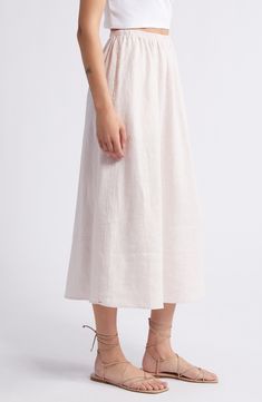 Fashioned with an easy elastic waist and handy pockets, this lightweight skirt made from airy linen is a warm-weather essential. 33" length Elastic waist Side-seam pockets 100% linen Machine wash, tumble dry Imported Nordstrom, Linen Midi Skirt, Day Lily, Lightweight Skirt, Warm Weather, Midi Skirt, Elastic Waist, Lily, Elastic