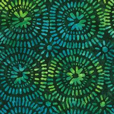 green and blue flowers on black background with watercolor effect in the form of circles