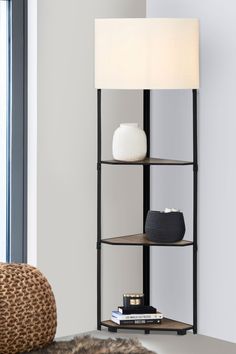 a lamp that is on top of a shelf