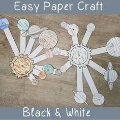 an easy paper craft for black and white kids with pictures of the solar system on it