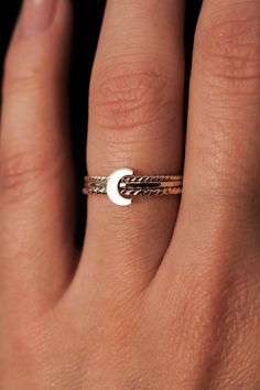 Dive into the celestial charm of our Moon Ring! The lunar-inspired design features a dainty moon on a simple, textured band - providing an adorable accent to any stack. The band measures approximately 1mm in width and features a lightly hammered finish. The moon detail measures approximately 6mm in width. This listing is for ONE SINGLE Moon Ring in STERLING SILVER metal. This ring is a great alternative to a stacking ring and is a perfect ring to mix and match with your favorite stacking rings. Every piece is organic and unique — no two Hannah Naomi pieces are exactly alike.Hand-crafted to order in our Portland, OR studio. Solver Rings, Dainty Band, Moon Ring, Silver Moon, Stacking Ring, Perfect Ring, Ring Sterling Silver, Stacking Rings, Cute Jewelry