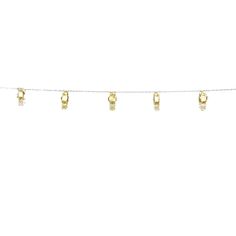 a white string with yellow lights hanging from it's ends on a white background