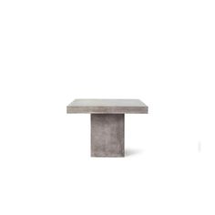 a concrete table on a white background with no one around it or in the photo