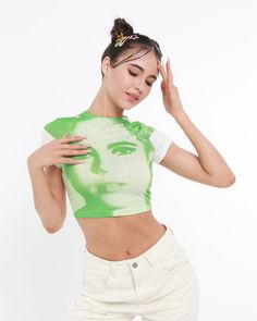 Model (WearingXS):Height: 176cm | Bust: 85cm | Waist: 60cm | Hip: 95cmDetails:Y2K-inspired Abstract Face TeeLength:CroppedSleeve Length:Short sleevesMaterial:95% Cotton + 5% Polyester Green Y2k Stretch T-shirt, Fitted Green Y2k T-shirt, Fitted Green Top For Streetwear, Fitted 90s Style Summer Tops, Fitted Green Graphic Print T-shirt, Fitted Green T-shirt With Graphic Print, Fitted Green 90s Tops, Fitted Green Trendy T-shirt, 90s Crew Neck Summer Crop Top