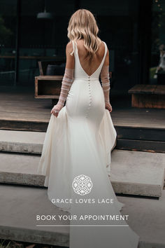 a woman in a wedding dress standing on steps with the words grace loves lace book your appointment