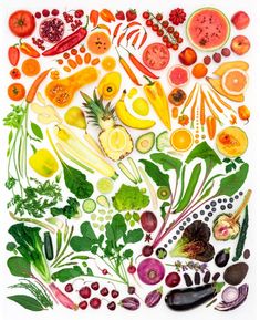 an assortment of fruits and vegetables are arranged in a square pattern on a white background