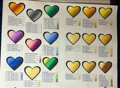 a sheet of paper that has different colored hearts on it, with the names and colors below them