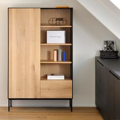 a book shelf with books and other items on it