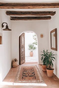 Elegant spanish hallway blending rustic elements with modern touches for a timeless spanish style hallway Spanish Countryside Aesthetic, Spanish Style Hallway, Spanish Hallway, Spanish Countryside, Style Hallway, Cozy Window Seat, Ibiza Style, Entry Way Design