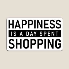 a sticker with the words happiness is a day spent shopping in black and white